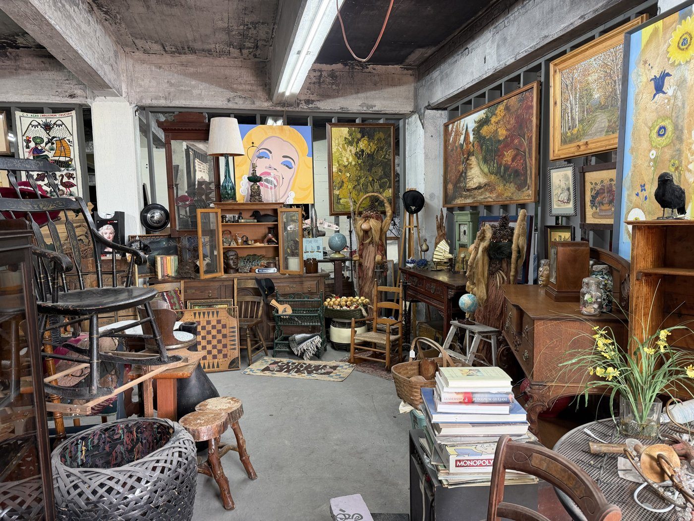 Antique furniture, paintings and collectibles on display in the shop